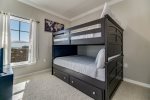 Guest bedroom 2 with full bunks and a trundle 
